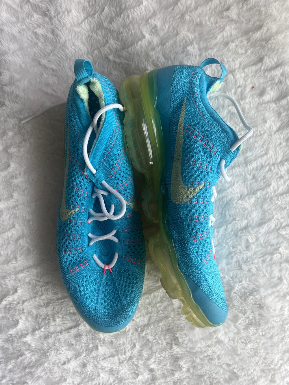 Nike men’s Turquoise Flyknit Sneakers with Lime Air Sole